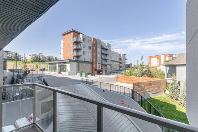 208 - 30 Shawnee Common Sw, Condo with 2 bedrooms, 2 bathrooms and 1 parking in Calgary AB | Image 18