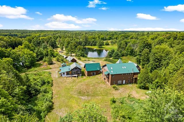 12059 Road 509 Road, House detached with 5 bedrooms, 5 bathrooms and 20 parking in North Frontenac ON | Image 2