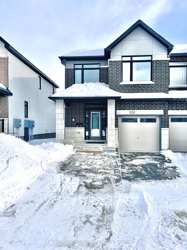 330 Ibanez Walk, House attached with 3 bedrooms, 4 bathrooms and 3 parking in Ottawa ON | Image 1