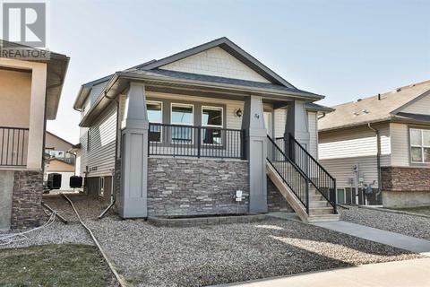 54 Sunridge Boulevard W, House detached with 3 bedrooms, 3 bathrooms and 4 parking in Lethbridge AB | Card Image