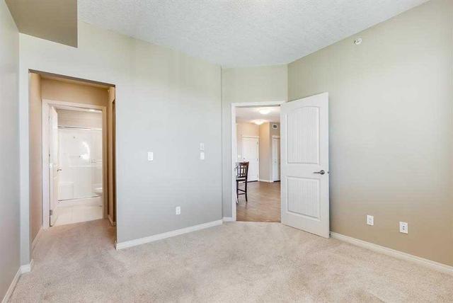 1407 - 522 Cranford Drive Se, Condo with 2 bedrooms, 2 bathrooms and 1 parking in Calgary AB | Image 12