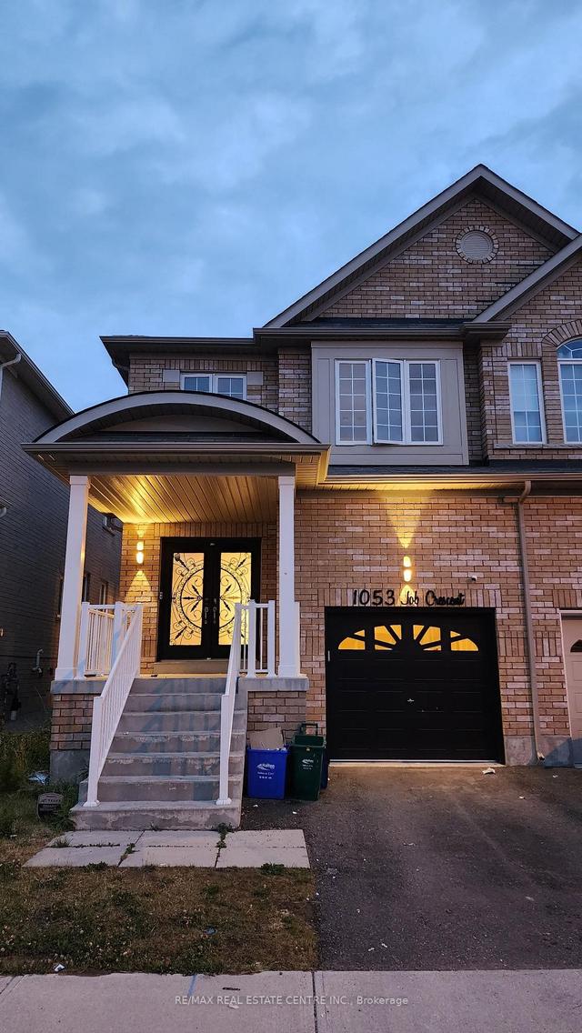 1053 Job Cres, House semidetached with 4 bedrooms, 4 bathrooms and 2 parking in Milton ON | Image 1