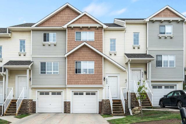 593 Panatella Boulevard Nw, Home with 3 bedrooms, 1 bathrooms and 2 parking in Calgary AB | Image 1