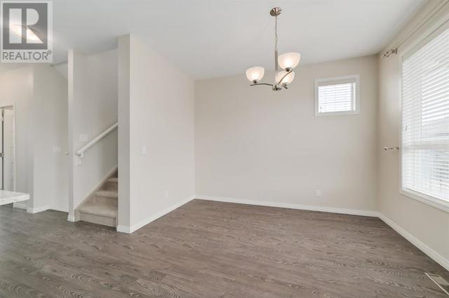 605, - 1086 Williamstown Boulevard Nw, House attached with 3 bedrooms, 2 bathrooms and 4 parking in Airdrie AB | Image 16