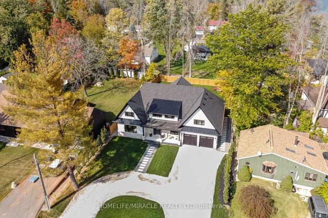 862 Kennedy Rd, House detached with 4 bedrooms, 3 bathrooms and 10 parking in Innisfil ON | Image 1