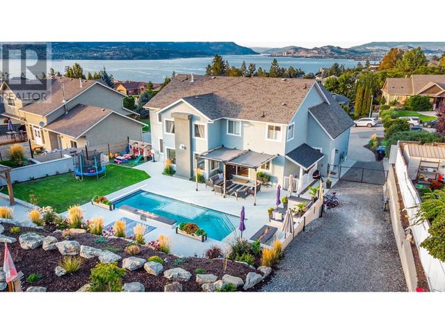 309 Tanager Drive, House detached with 6 bedrooms, 3 bathrooms and 2 parking in Kelowna BC | Image 2