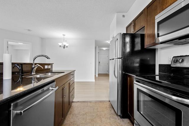 401 - 2419 Centre Street Nw, Condo with 2 bedrooms, 2 bathrooms and 1 parking in Calgary AB | Image 9