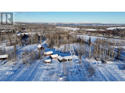 7001 Uncha Lake Road, House detached with 2 bedrooms, 1 bathrooms and null parking in Bulkley Nechako E BC | Card Image