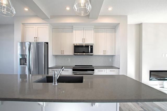864 Lawthorn Way Se, Home with 3 bedrooms, 2 bathrooms and 2 parking in Calgary AB | Image 18