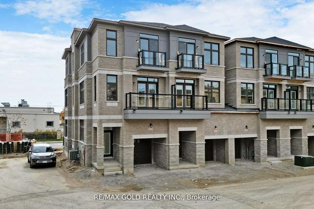 4 - 2a Muir Ave, House attached with 3 bedrooms, 3 bathrooms and 2 parking in Toronto ON | Image 1