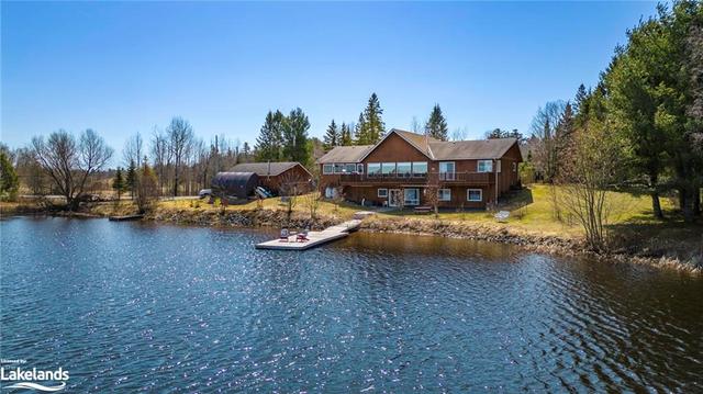 A SPACIOUS, meticulously maintained WATERFRONT RESIDENCE on the highly sought-after Lake Manitouwabing. | Image 1