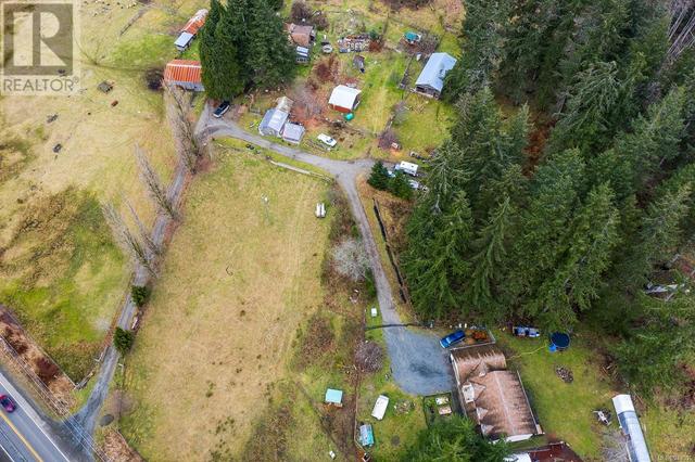 7522 Island Hwy N, House detached with 4 bedrooms, 3 bathrooms and 10 parking in Comox Valley C (Puntledge   Black Creek) BC | Image 11