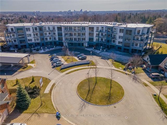 100 - 1705 Fiddlehead Pl, Condo with 1 bedrooms, 2 bathrooms and 2 parking in London ON | Image 31