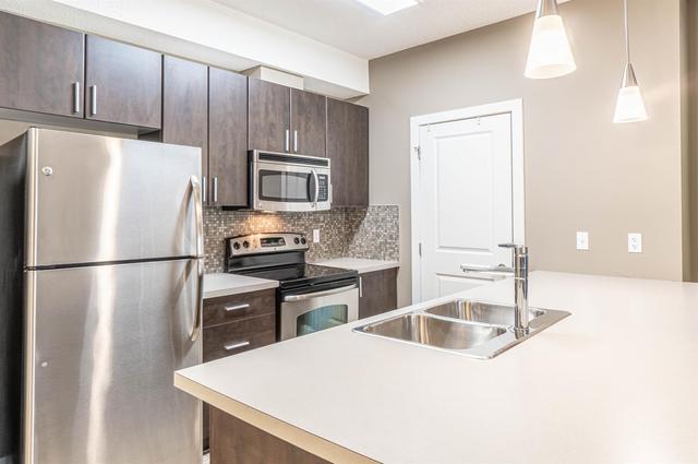 127 - 11 Millrise Drive Sw, Condo with 2 bedrooms, 2 bathrooms and 1 parking in Calgary AB | Image 2