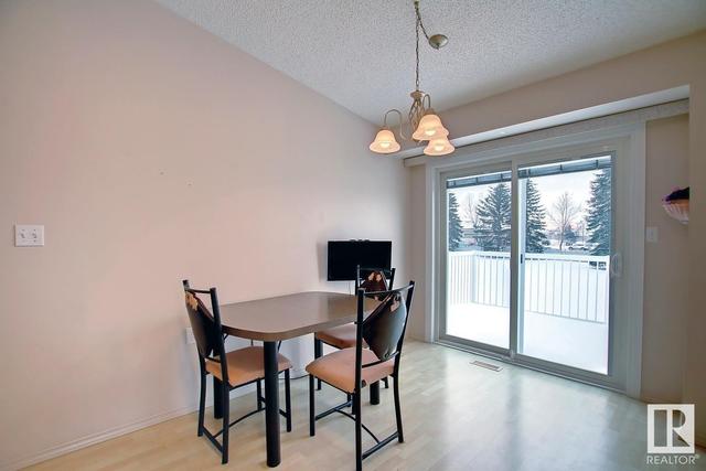 6584 158 Av Nw, House attached with 3 bedrooms, 2 bathrooms and null parking in Edmonton AB | Image 11
