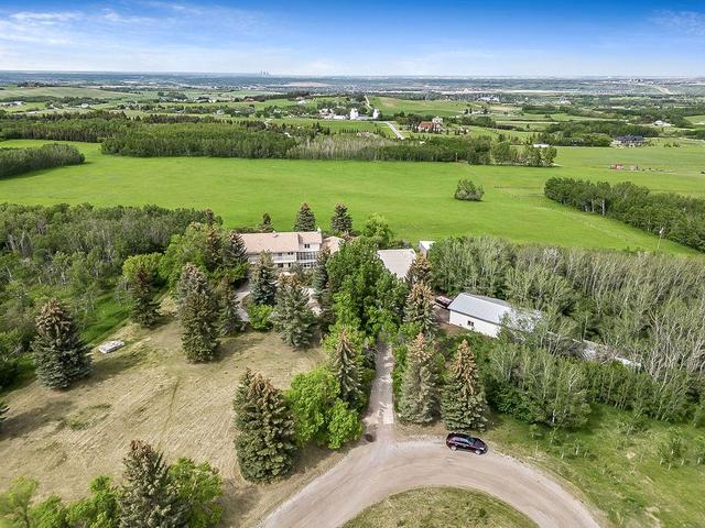8016 266 Avenue W, House detached with 6 bedrooms, 7 bathrooms and 12 parking in Foothills County AB | Image 2