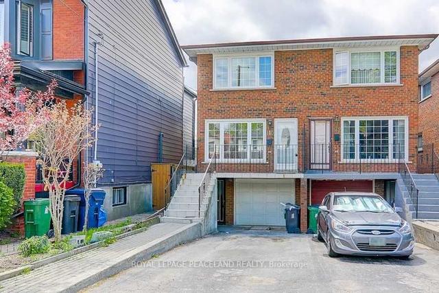 110 Leslie St, House semidetached with 3 bedrooms, 2 bathrooms and 1 parking in Toronto ON | Image 1