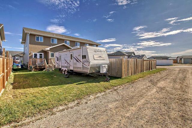 117 Henderson Crescent, Home with 3 bedrooms, 1 bathrooms and 2 parking in Penhold AB | Image 35