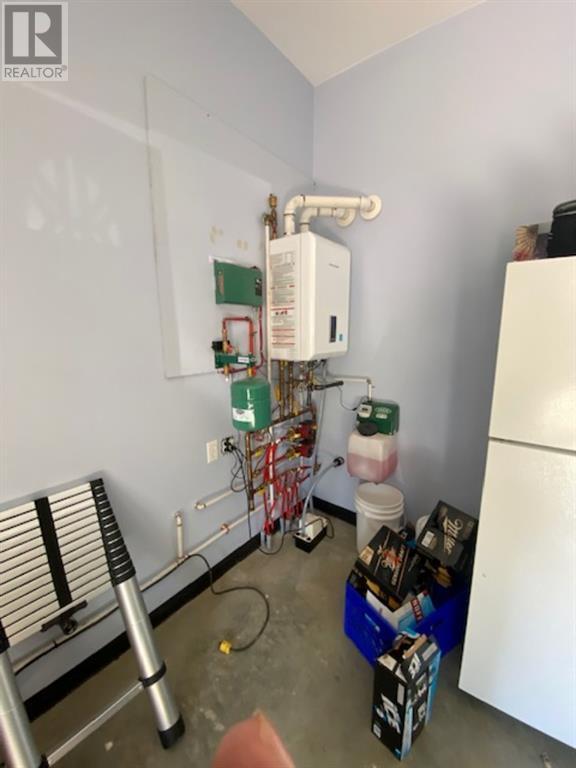 Boiler system for in floor heat in the "RV" garage | Image 31