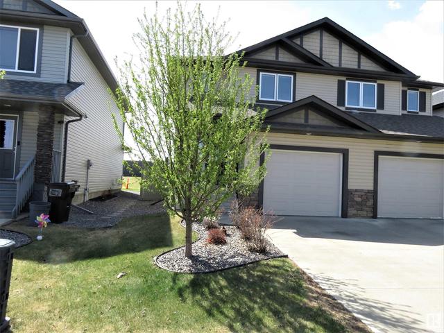 7033 Cardinal Wy Sw, House semidetached with 3 bedrooms, 2 bathrooms and 4 parking in Edmonton AB | Card Image