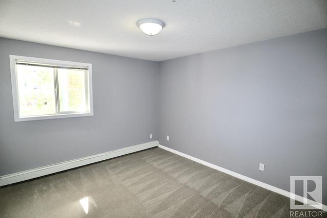 205 - 9930 100 Av, Condo with 2 bedrooms, 2 bathrooms and 1 parking in Fort Saskatchewan AB | Image 9