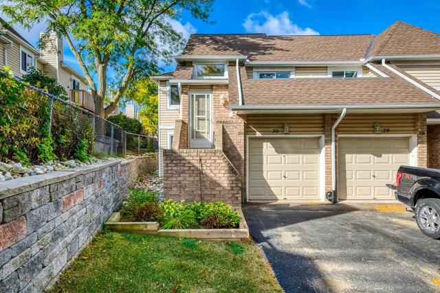 30 - 205 Highland Cres, Townhouse with 2 bedrooms, 2 bathrooms and 3 parking in Kitchener ON | Card Image
