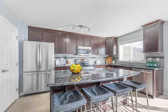 704 Windridge Road Sw, House detached with 3 bedrooms, 2 bathrooms and 5 parking in Airdrie AB | Image 7