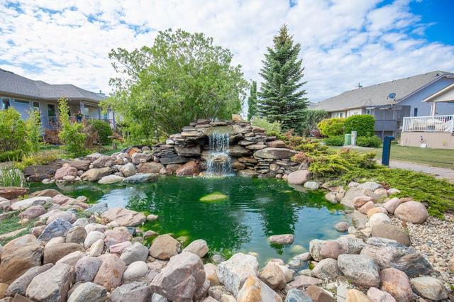 Front patio has a view of this community water fountain feature | Image 27