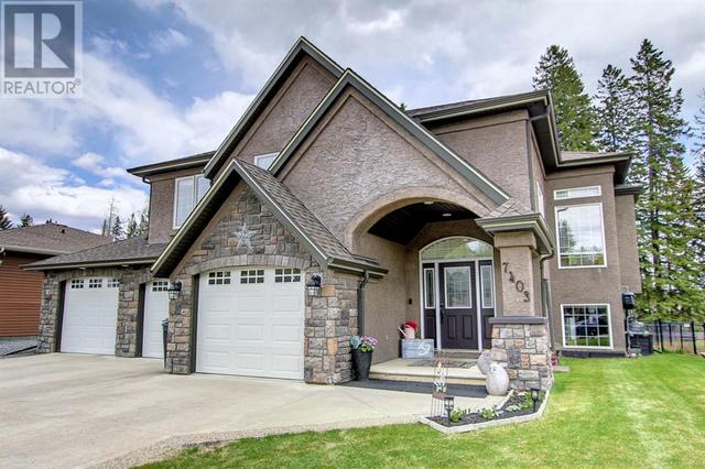 7403 61 Street, House detached with 4 bedrooms, 3 bathrooms and 4 parking in Rocky Mountain House AB | Image 2
