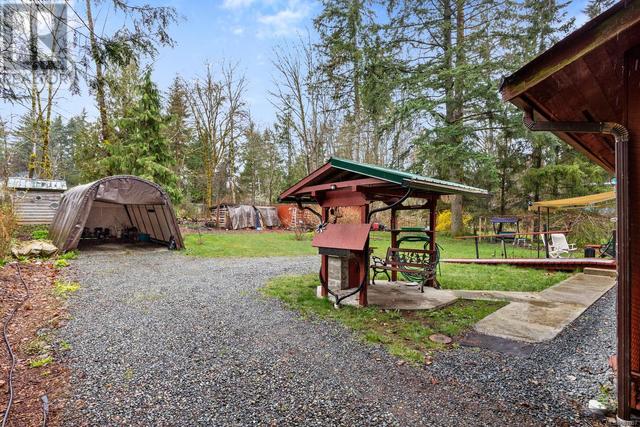 353 Powerhouse Rd, House detached with 4 bedrooms, 5 bathrooms and 10 parking in Comox Valley C (Puntledge   Black Creek) BC | Image 46