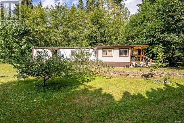 8185 Island Hwy S, House detached with 4 bedrooms, 4 bathrooms and 6 parking in Comox Valley A BC | Image 52