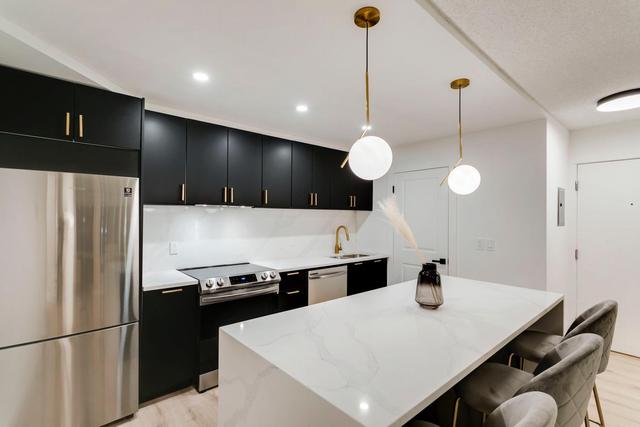 301 - 1331 15 Avenue Sw, Condo with 2 bedrooms, 1 bathrooms and 1 parking in Calgary AB | Card Image