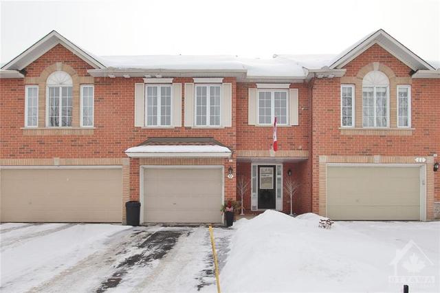 9 Macassa Circle, Townhouse with 3 bedrooms, 3 bathrooms and 3 parking in Ottawa ON | Image 1