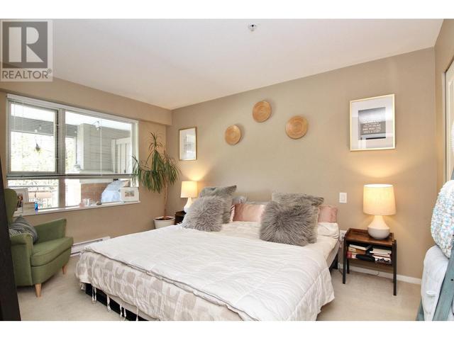 301 - 700 Klahanie Drive, Condo with 2 bedrooms, 2 bathrooms and 2 parking in Port Moody BC | Image 15