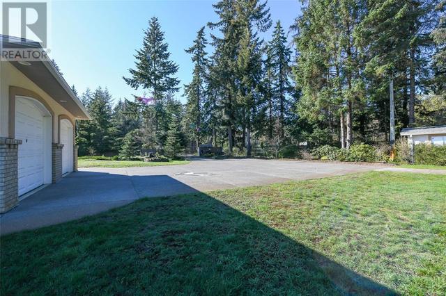 501 Arbutus Bay Rd, House detached with 3 bedrooms, 3 bathrooms and 10 parking in Comox Valley A BC | Image 27