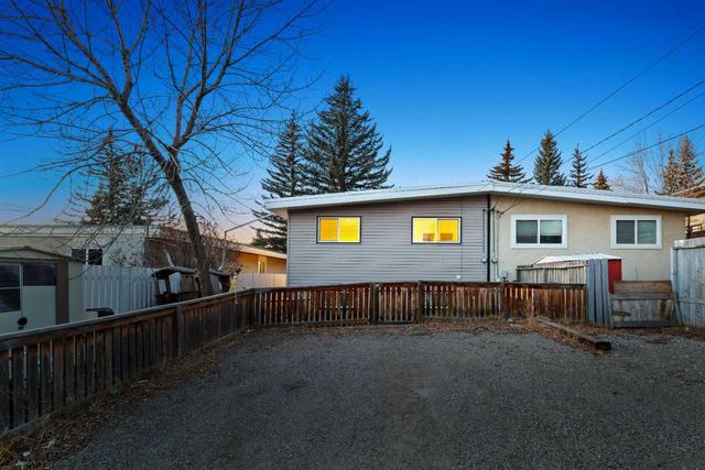 5834 Dalgleish Road Nw, Home with 5 bedrooms, 2 bathrooms and 2 parking in Calgary AB | Image 50