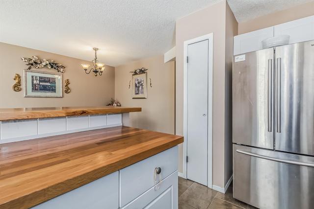 19 Millrose Place Sw, Home with 3 bedrooms, 2 bathrooms and 2 parking in Calgary AB | Image 9