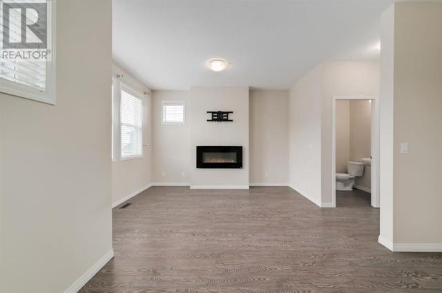 605, - 1086 Williamstown Boulevard Nw, House attached with 3 bedrooms, 2 bathrooms and 4 parking in Airdrie AB | Image 13