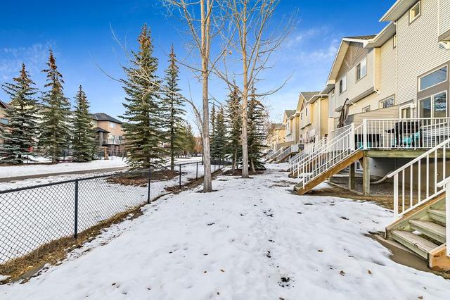 12 Crystal Shores Cove, Home with 2 bedrooms, 2 bathrooms and 2 parking in Calgary AB | Image 32