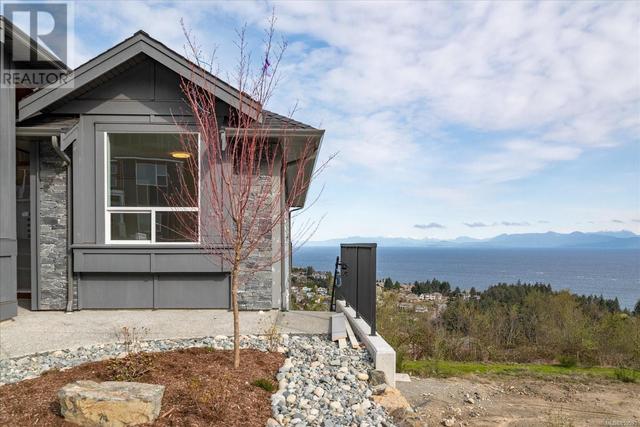4684 Ambience Dr, House detached with 7 bedrooms, 5 bathrooms and 3 parking in Nanaimo BC | Image 2