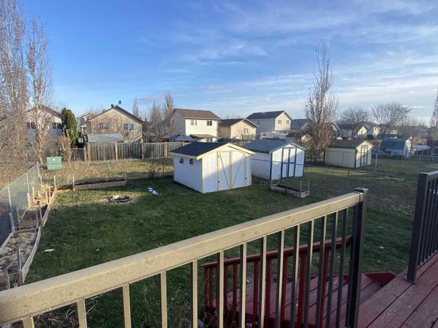 6301 90 Street, Home with 4 bedrooms, 1 bathrooms and null parking in Grande Prairie AB | Image 20