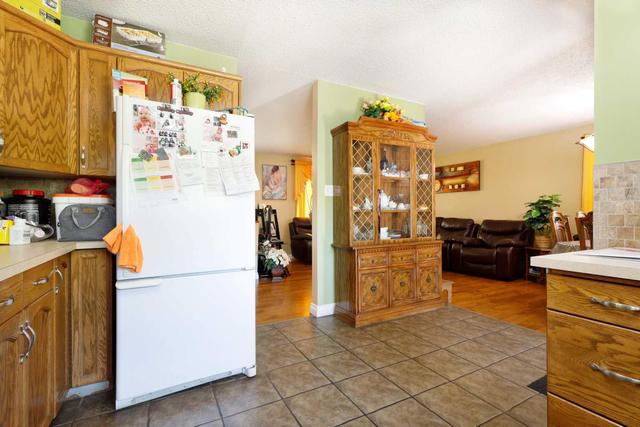 412 4 Street W, House detached with 4 bedrooms, 2 bathrooms and 3 parking in Brooks AB | Image 13