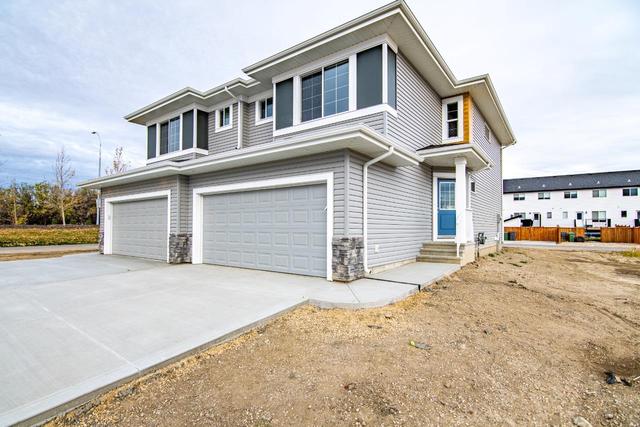 50 Earl Close, Home with 3 bedrooms, 2 bathrooms and 4 parking in Red Deer County AB | Image 24
