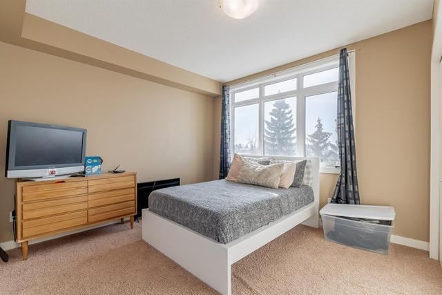 401 - 2419 Centre Street Nw, Condo with 2 bedrooms, 2 bathrooms and 1 parking in Calgary AB | Image 16