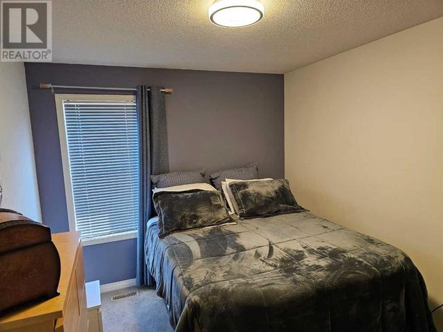 2, - 402 Couleecreek Boulevard S, House attached with 2 bedrooms, 2 bathrooms and 2 parking in Lethbridge AB | Image 23