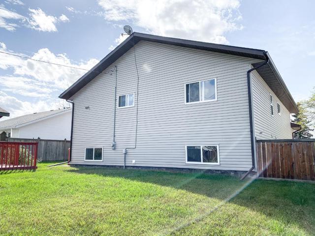 4503 50 Street, House detached with 3 bedrooms, 2 bathrooms and 4 parking in Saddle Hills County AB | Image 47