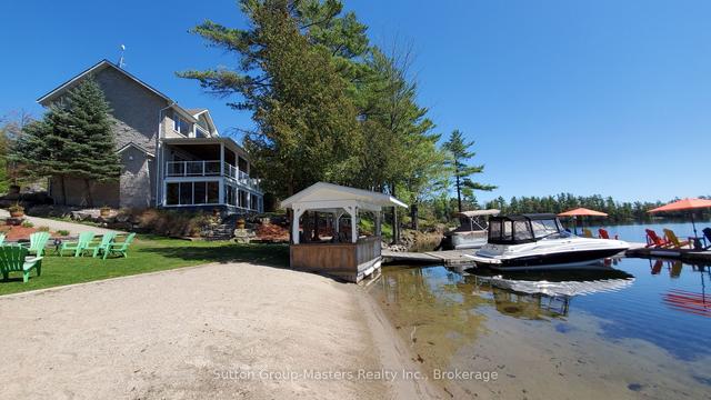 5058 Rock Cliff Lane, House detached with 3 bedrooms, 5 bathrooms and 24 parking in South Frontenac ON | Image 39