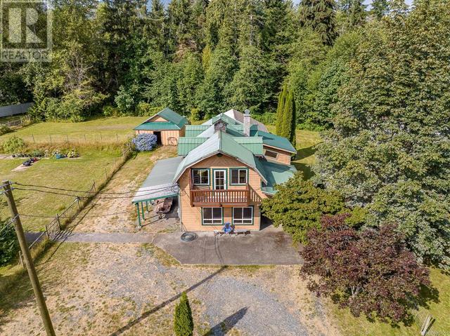 8185 Island Hwy S, House detached with 4 bedrooms, 4 bathrooms and 6 parking in Comox Valley A BC | Image 43