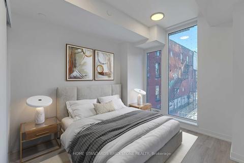 310 - 2 Augusta Ave, Condo with 1 bedrooms, 2 bathrooms and 0 parking in Toronto ON | Card Image