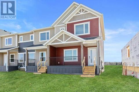 21 Gray Close, House attached with 3 bedrooms, 2 bathrooms and 2 parking in Sylvan Lake AB | Card Image